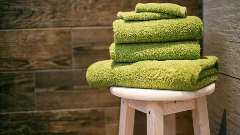 Arrange a Linen Cupboard So You Can Find the Right Set